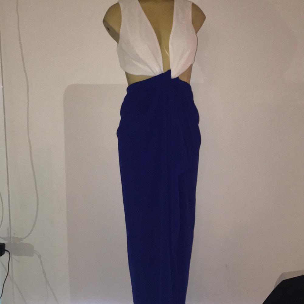 Low cut , side cuts flowly Long dress